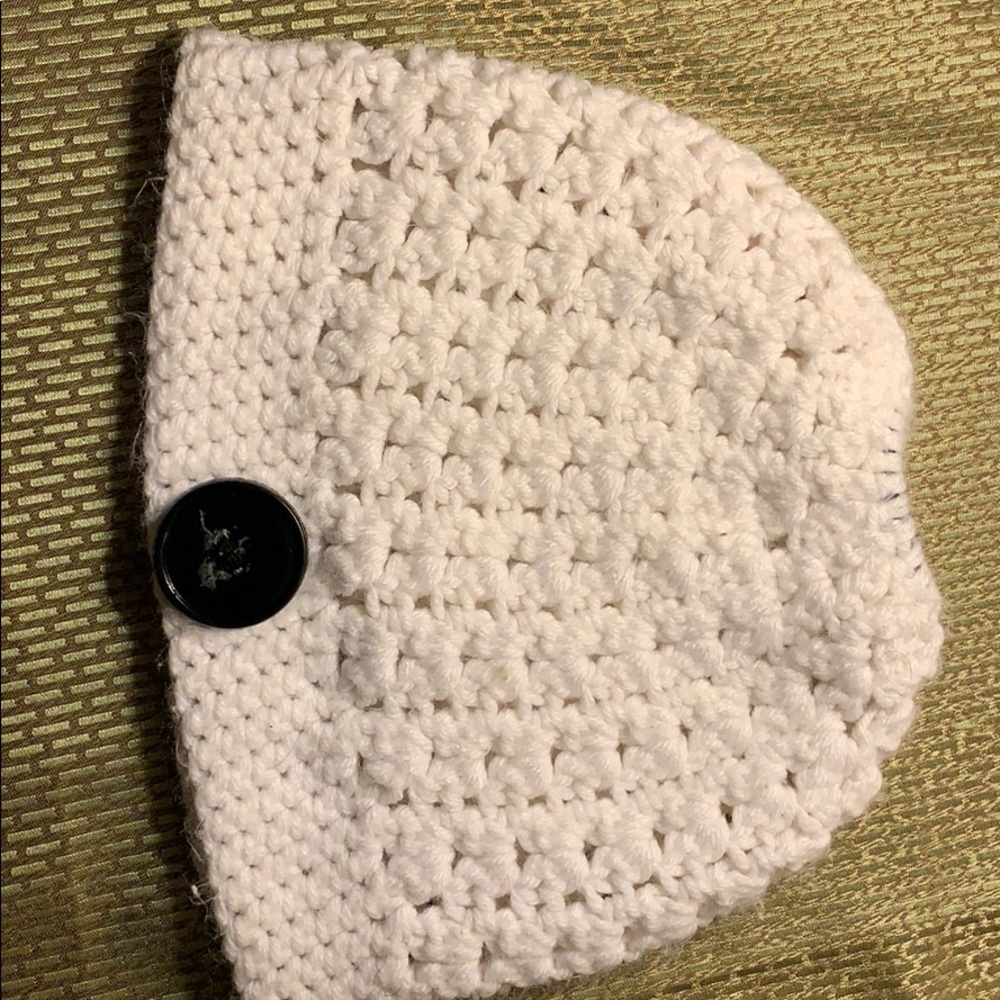 White hand knitted hat